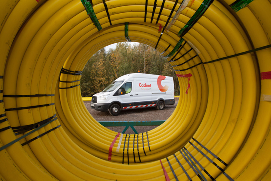 Cadent vehicle within yellow tubing spiral