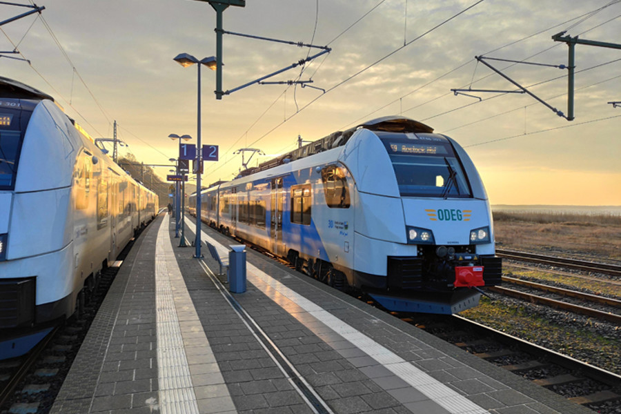 BeNEX train at platform at sunset