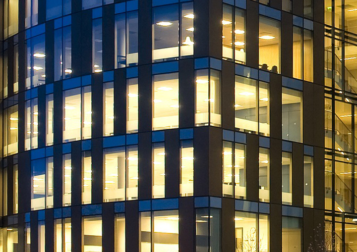 INPP picture of office building with all lights on