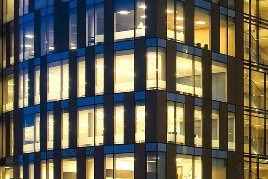 INPP picture of office building with all lights on